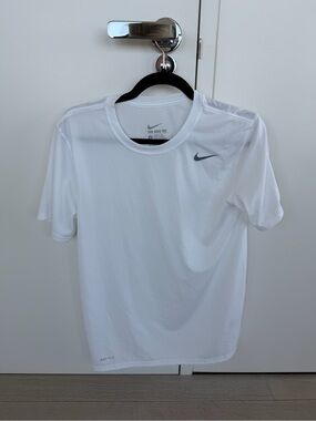 Nike White Short Sleeve Sports Tee with Gray Swoosh